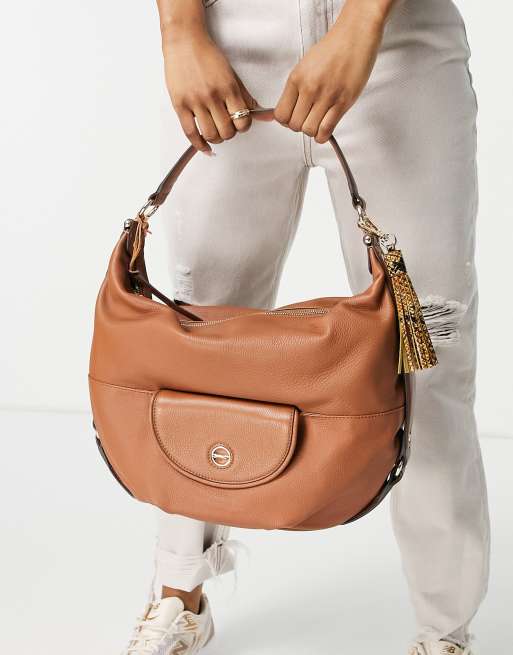 Paul Costelloe leather large shoulder bag with front pocket in tan