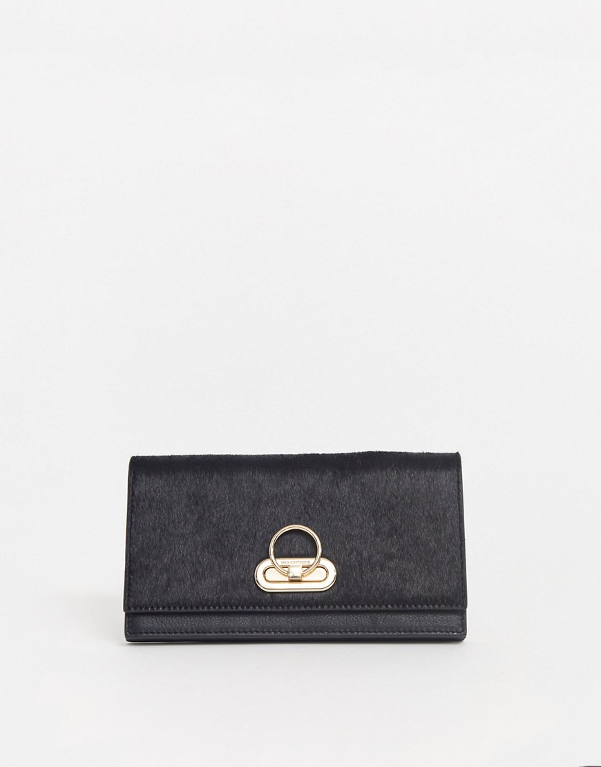 Paul Costelloe – Svart plånbok i äkta läder med viklock och guldfärgade metalldetaljer