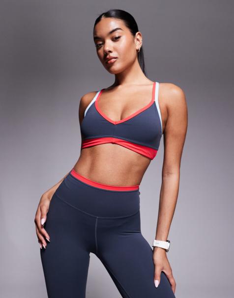 PE Nation Paramount sports bra in marine blue and strawberry