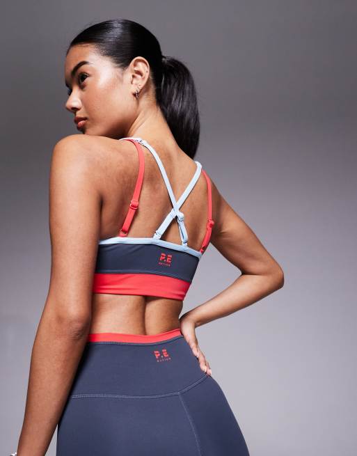 PE Nation Paramount sports bra in marine blue and strawberry, 3 of 4