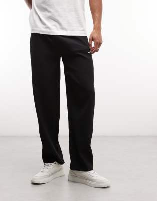 Pegador – Troy – Locker geschnittene, plissierte Hose in Schwarz | ASOS