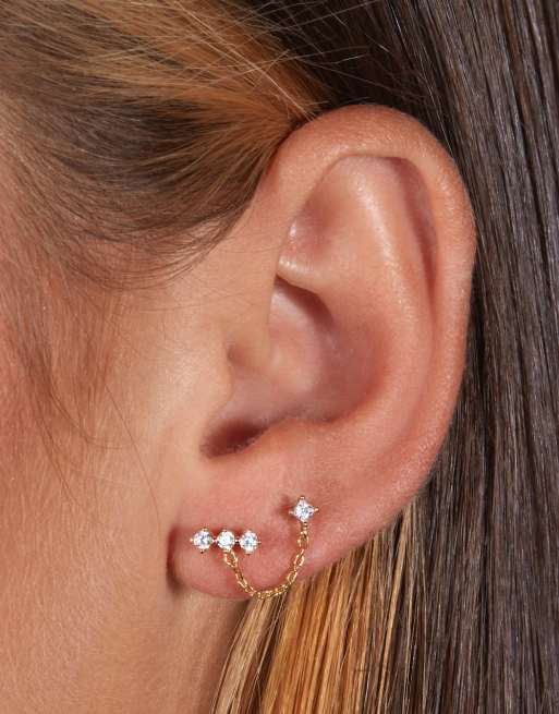 Pendiente barbell doble chapado en oro con cadena y circonitas exclusivo de With Bling