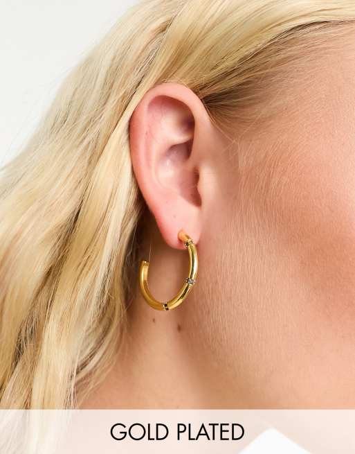 Pendientes de aro dorados con diseño de bambú chapados en oro Z de Accessorize