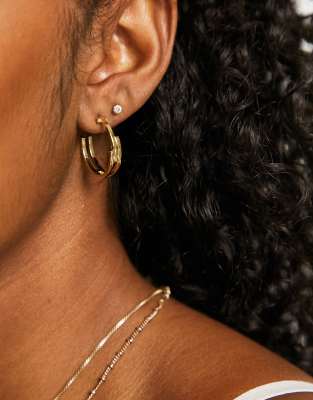 Pendientes de aro dorados de acero inoxidable de Tommy Hilfiger