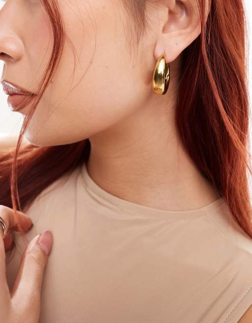 Pendientes de aro dorados gruesos con diseño abombado de acero inoxidable de ALDO