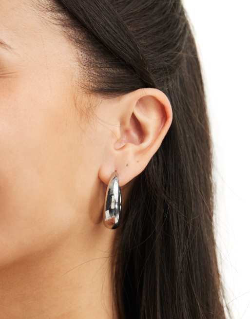 Pendientes de aro plateados gruesos con diseño abombado de acero inoxidable de ALDO