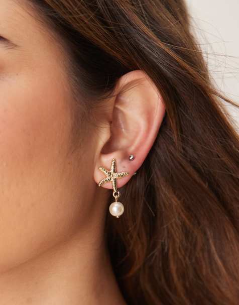 Pendientes de botón dorados con forma de estrella de mar y detalle de perla de DesignB London - view 1