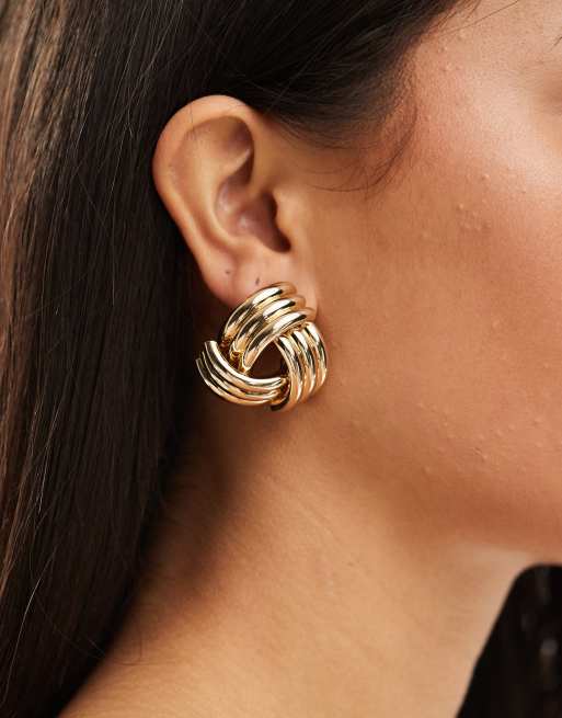 Pendientes de botón dorados extragrandes de estilo vintage con diseño de nudo de ALDO