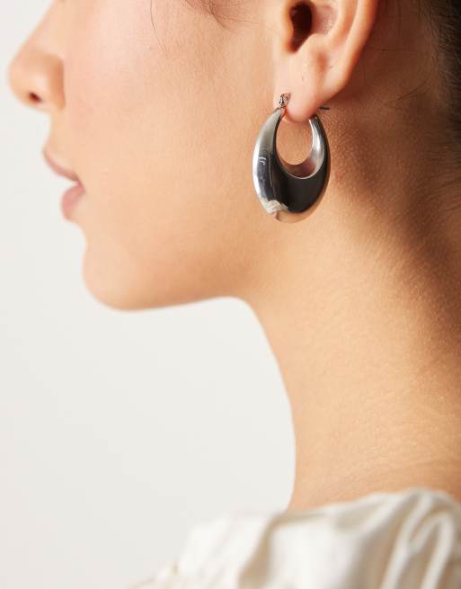 Pendientes de botón plateados gruesos con diseño de gota de acero inoxidable de Lost Souls