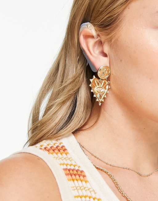 Pendientes dorados con colgante en forma de corazón con ojo de Liars & Lovers