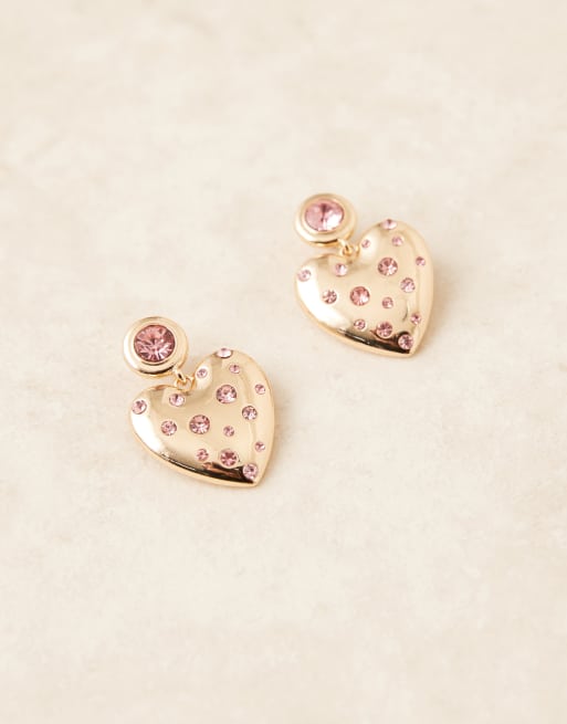 Pendientes dorados con diseño de corazón y cristales rosas de ASOS DESIGN, 2 de 3