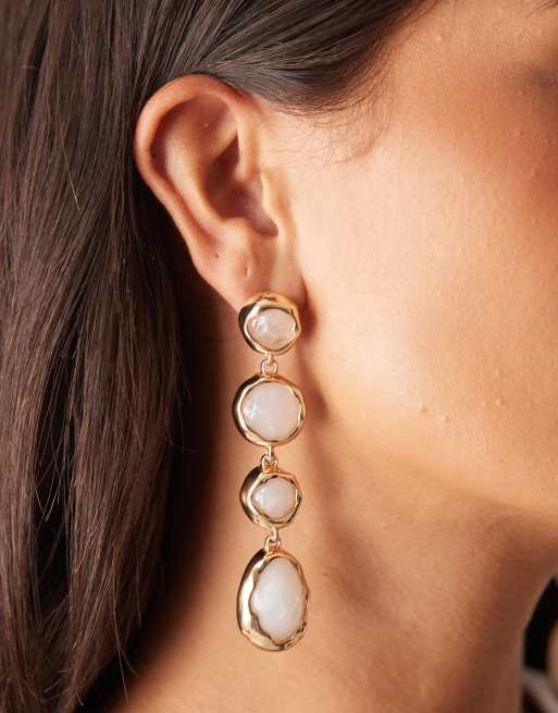 Pendientes dorados con diseño de perla de imitación colgante de Mango