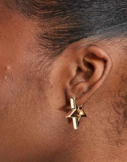 Pendientes dorados en forma de estrella de DesignB London 