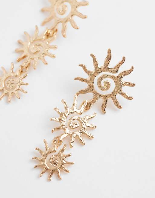 Pendientes largos dorados con diseño de tres soles de Accessorize, 3 de 4