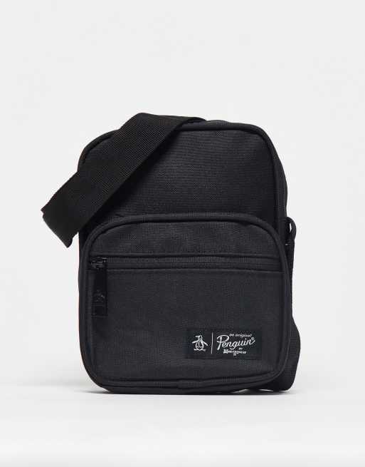 Penguin logo crossbody bag in black | ASOS