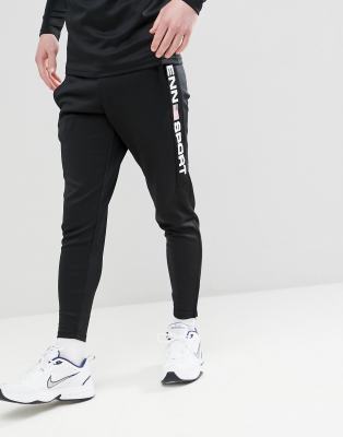 black joggers with checkered sides