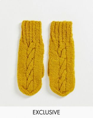 People Tree hand knitted wool mittens in mustard