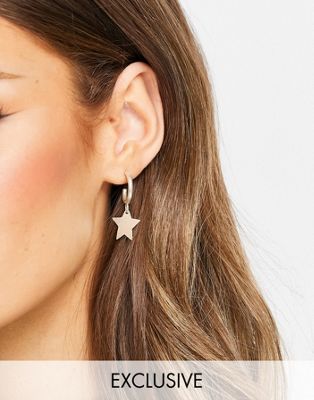People Tree handmade huggie earrings with star in silver