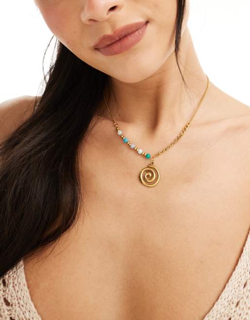 Petit Moments - Collana color oro con pendente a forma raggio di sole a spirale con perline 