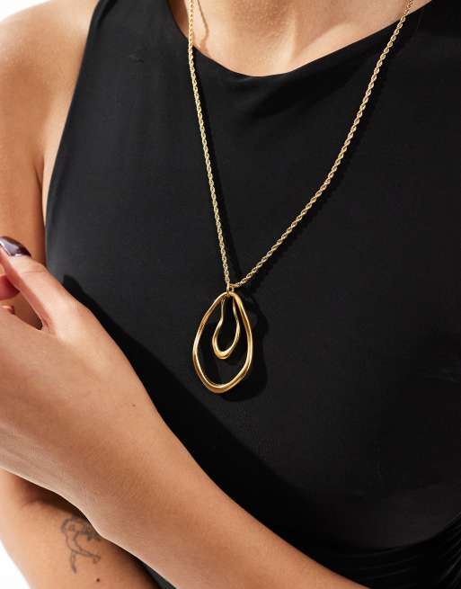 Petit Moments – Guldfärgade halsband med abstrakt hänge, 4 av 4