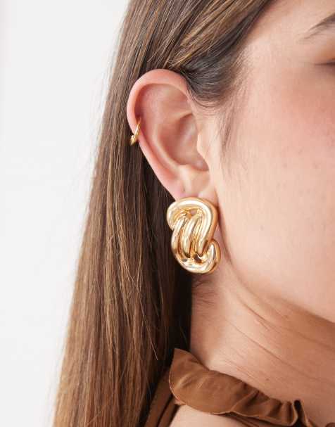 Petit Moments twisted stud earrings in gold - view 1