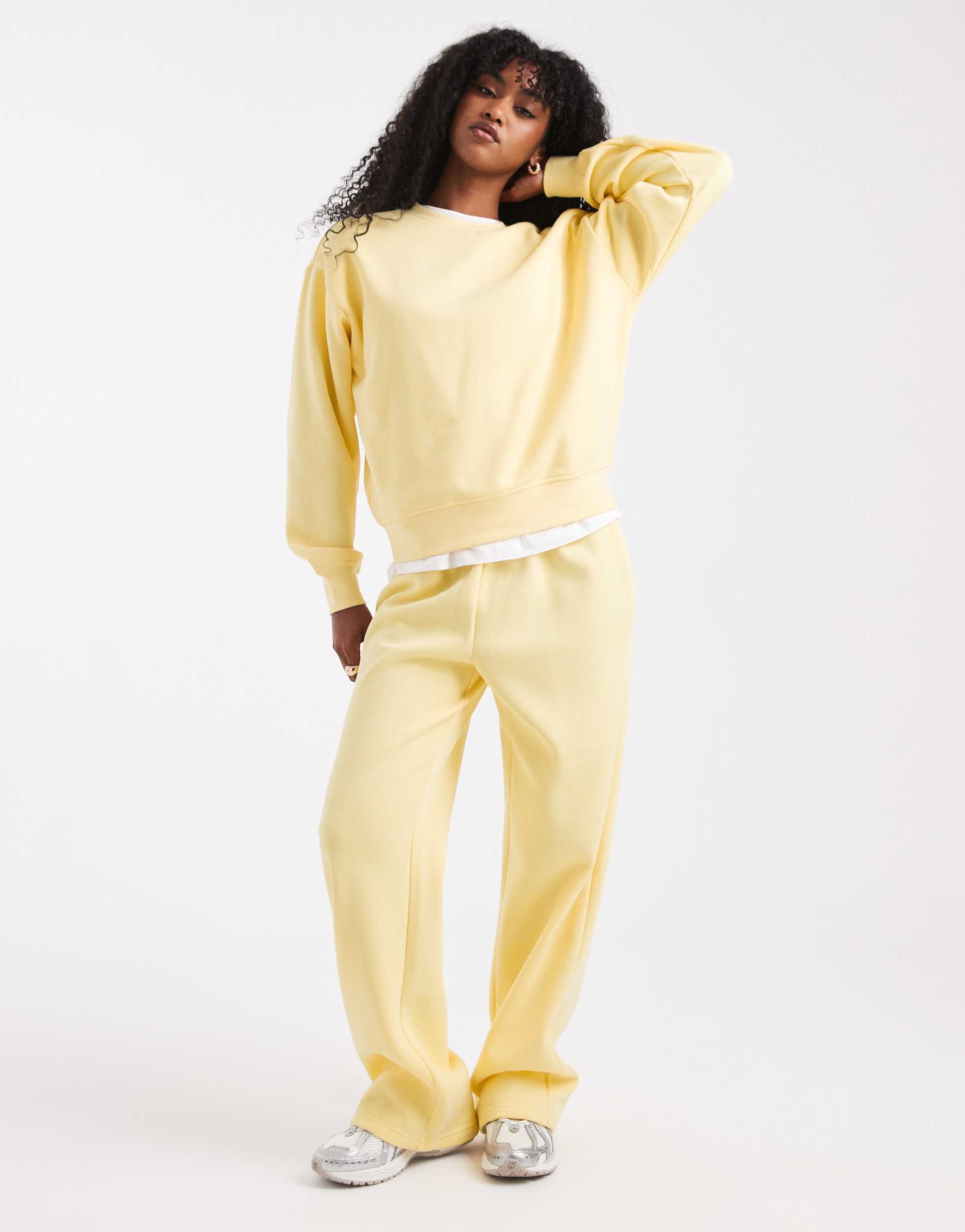 piece wide leg sweatpants in pale yellow - part of a set