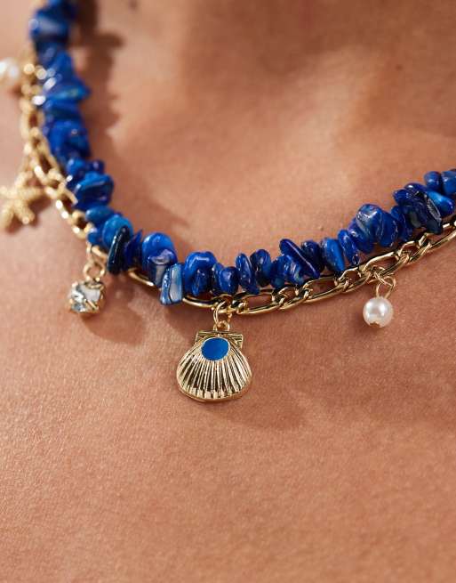 Pieces 2-layer necklace with stone & beach pendants in gold & blue