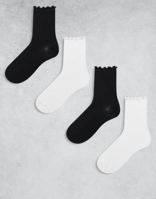 Pieces - 4er-Pack Socken mit Rüschensaum in Schwarz und Weiß