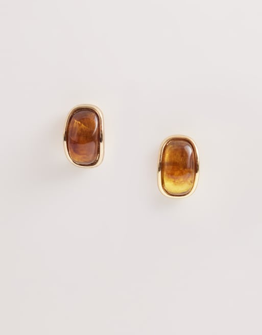Pieces amber colored earrings in gold tone