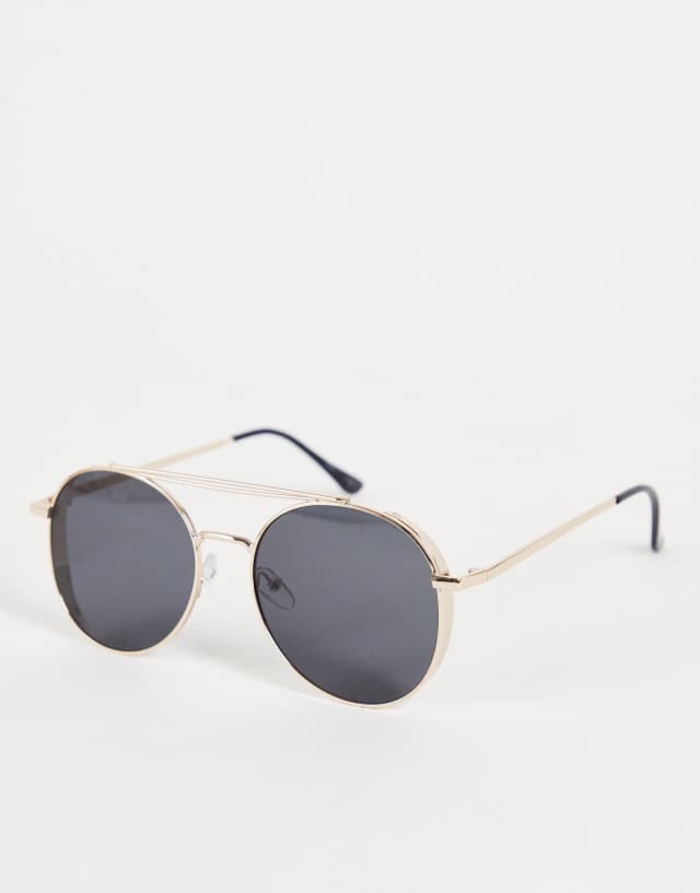 Pieces aviator sunglasses with gold rims and black tint lenses