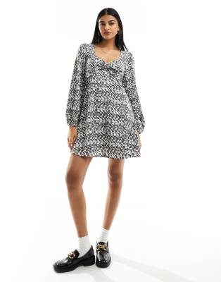 balloon sleeve mini tea dress in black and white print