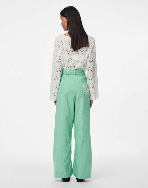 Pieces - Broek met wijde pijpen in groen