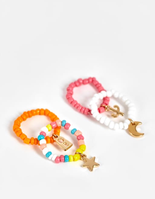 PIECES - Confezione da 4 anelli multicolore con perline e ciondoli