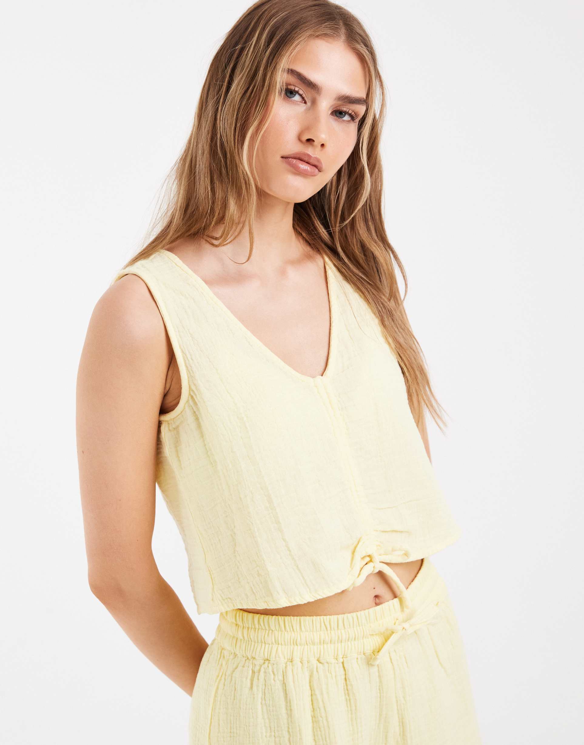 pieces crinkled cotton sleeveless tie front top in pastel yellow - part of a set