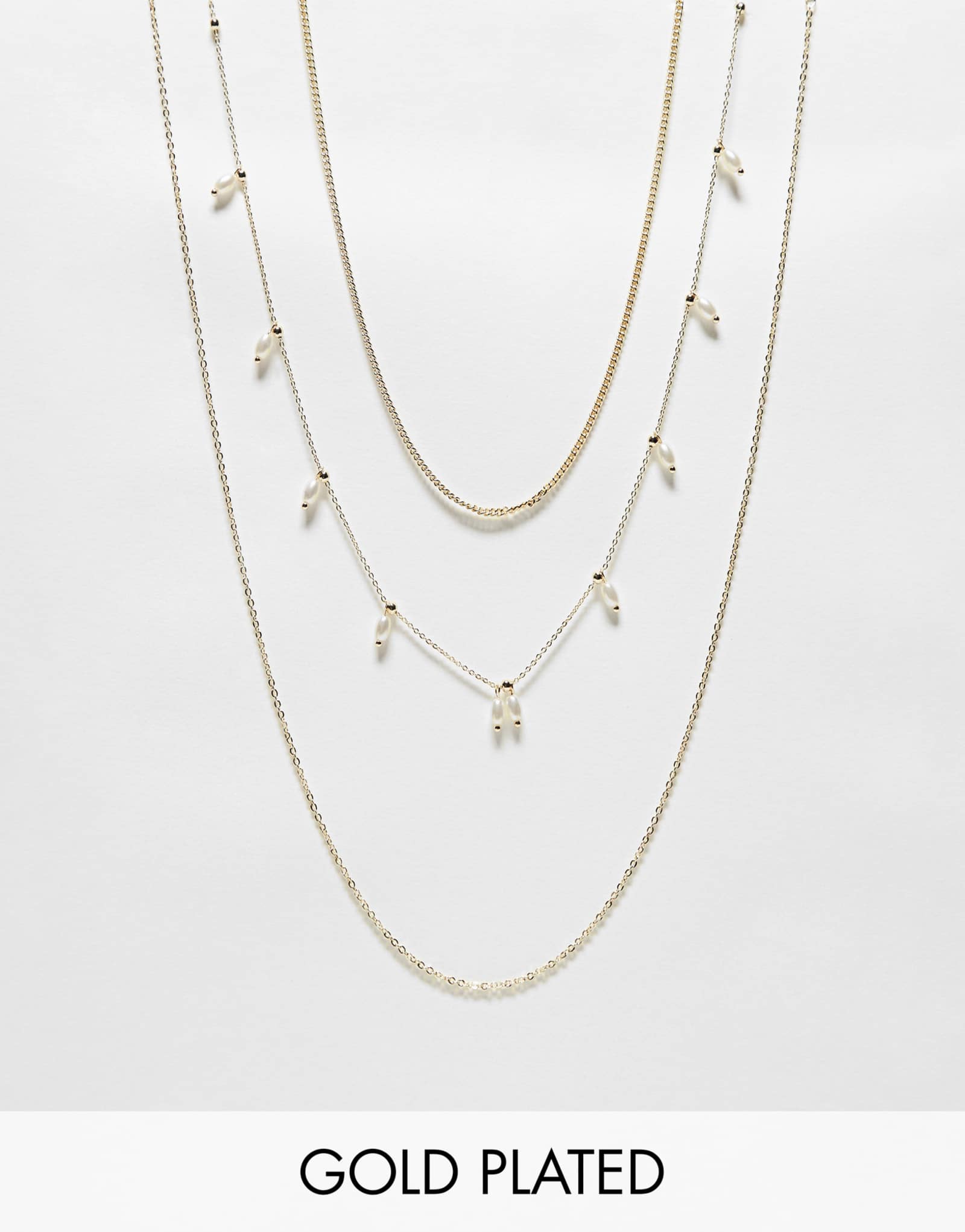 Комплект из 3-х ярусных ожерелий Pieces Curve с отделкой из искусственного жемчуга в золоте 5490₽