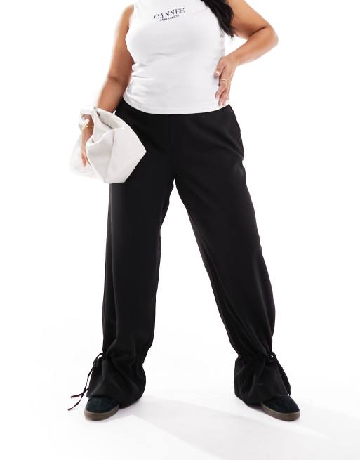 Pieces Curve - Broek met wijde pijpen en strikdetail in zwart