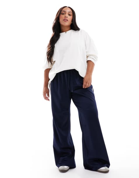 Pieces Curve - Broek met wijde pijpen en zijstreep in marineblauw - view 1