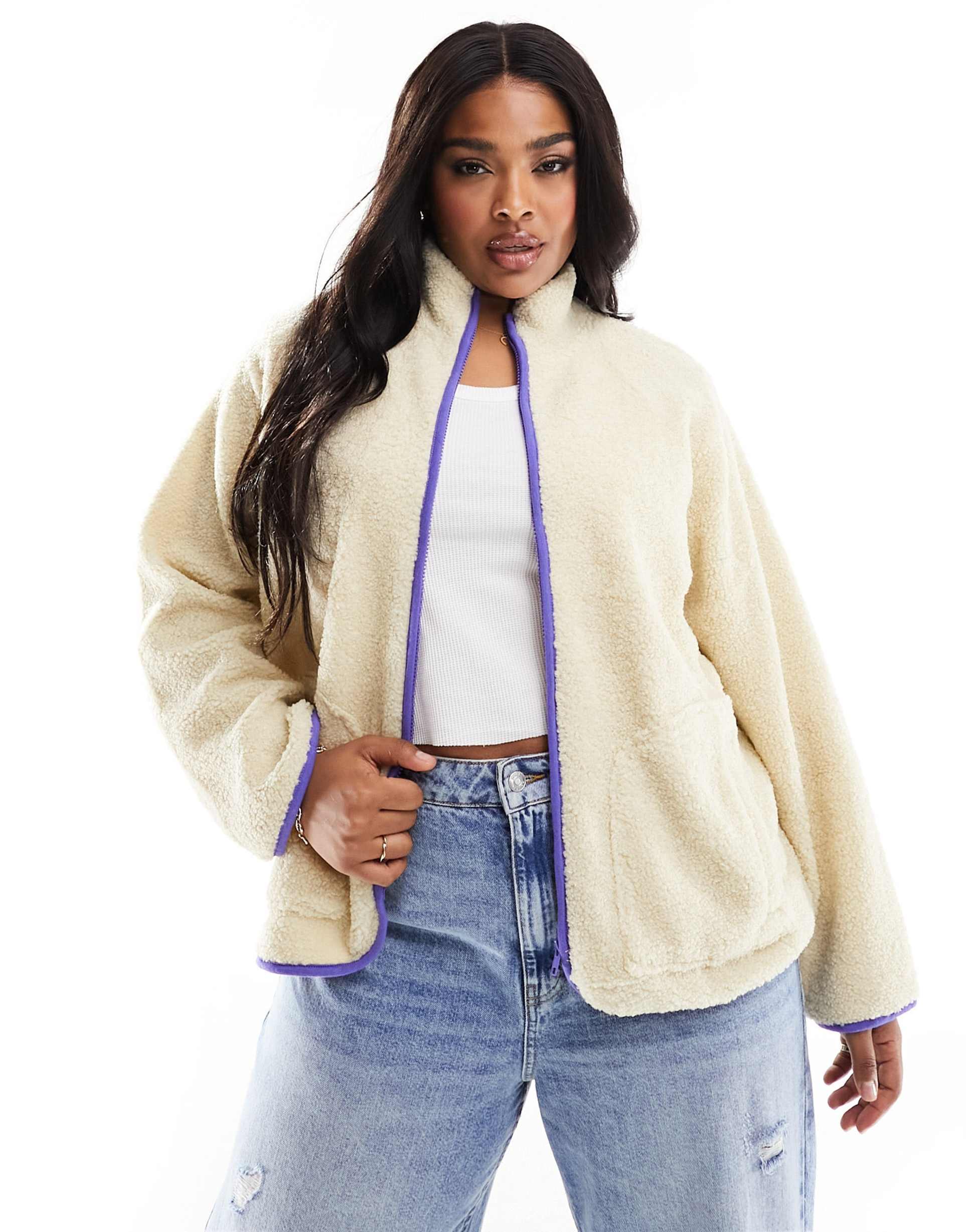 pieces curve fleece in cream with blue contrast binding