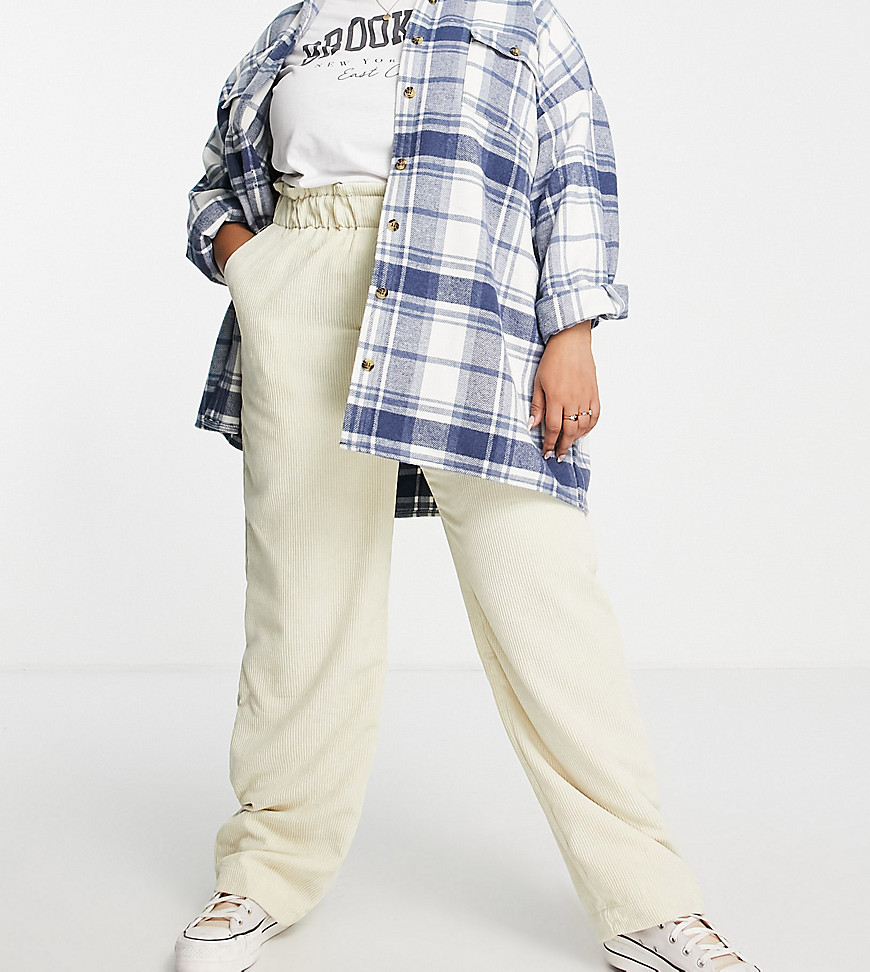Plus-size trousers by PIECES These trousers on repeat High rise Elasticated paperbag waist Functional pockets Regular fit