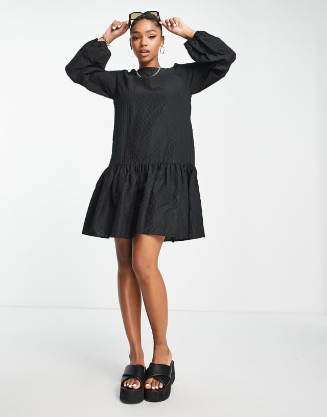 Pieces Darala drop hem smock mini dress in black