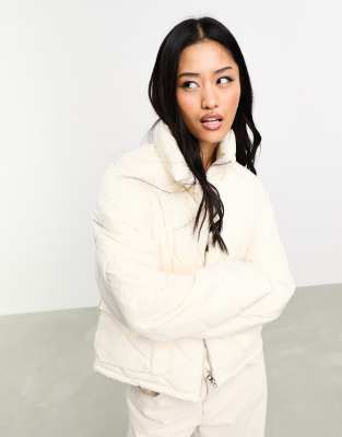 diagnoal quilted padded jacket in white