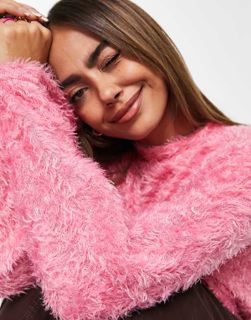 Pieces exclusive fluffy flared sleeve sweater in pink ASOS