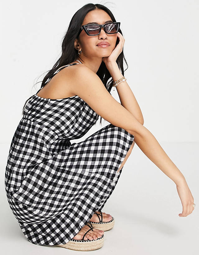 Pieces exclusive mini cami bust detail dress in black gingham