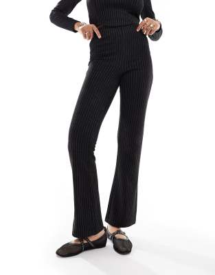 flared jersey high rise pants in black pinstripe -set