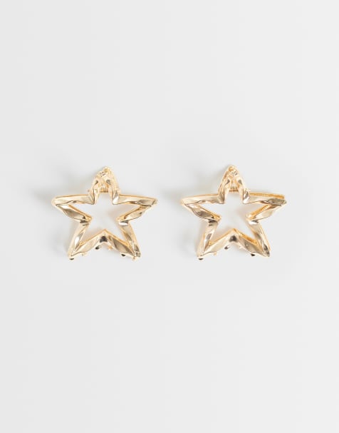 Pieces – Guldfärgade, stjärnformade, små klämmor i metall, 2-pack - view 1