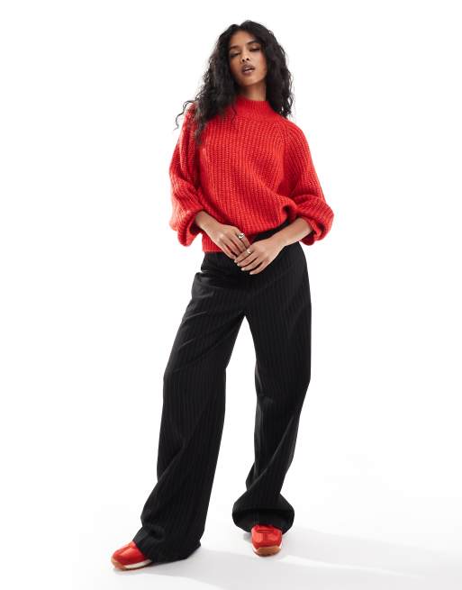 Red sweater and black pants deals