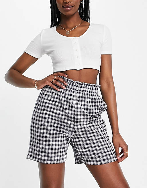 Pieces high waisted frill waistband gingham shorts in navy and white