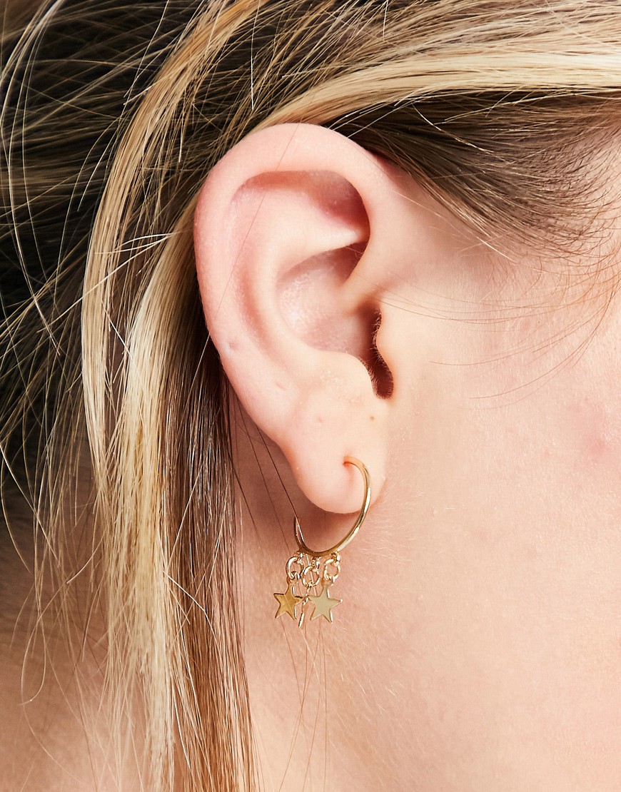 Pieces hoops with star charms in gold