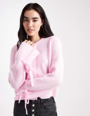 Pieces Pieces knitted cardigan with pearl buttons and bow tie cuffs in light pink