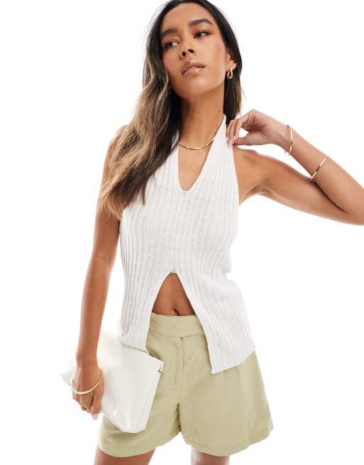 Pieces – Langes Neckholder-Oberteil aus Strick mit Schlitz vorn in Creme